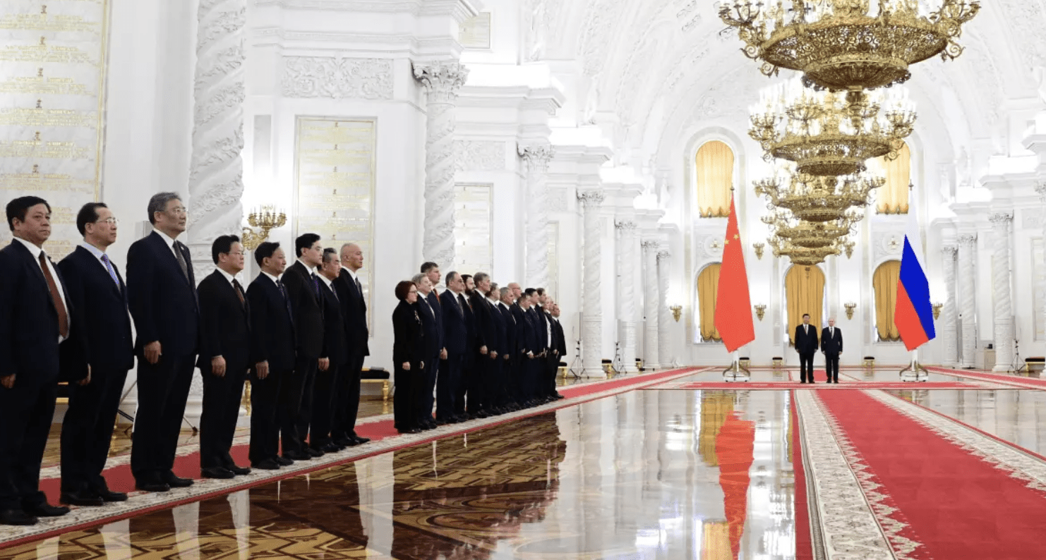 image of hallway with Russia and china flag on the end
