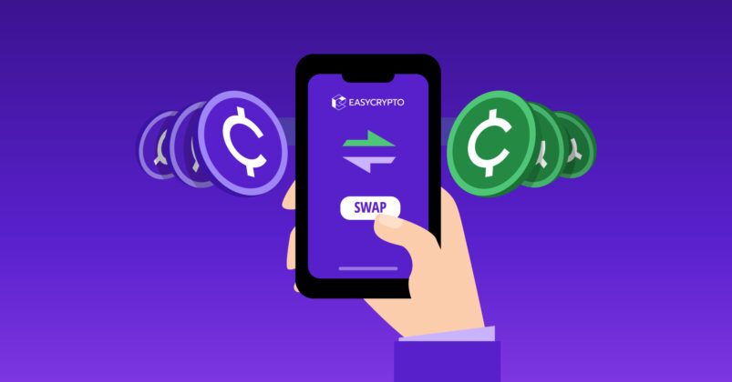 Illustration of a phone held by a hand with two coins hovering on the left and right to illustrate the idea of what is a crypto swap Illustration of a phone held by a hand with two coins hovering on the left and right to illustrate the idea of what is a crypto swap