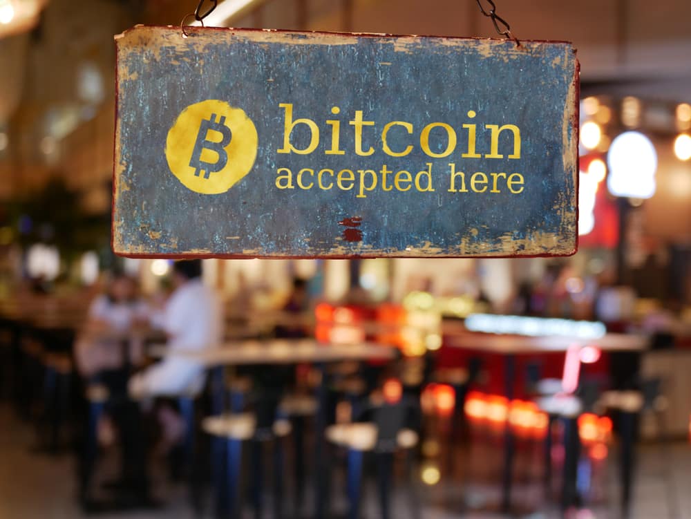 Sign that says bitcoin accepted here. 