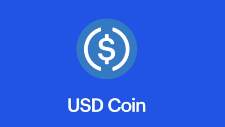 usd-coin-usdc-logo-blue-background The logo of USD Coin (USDC) on a blue background