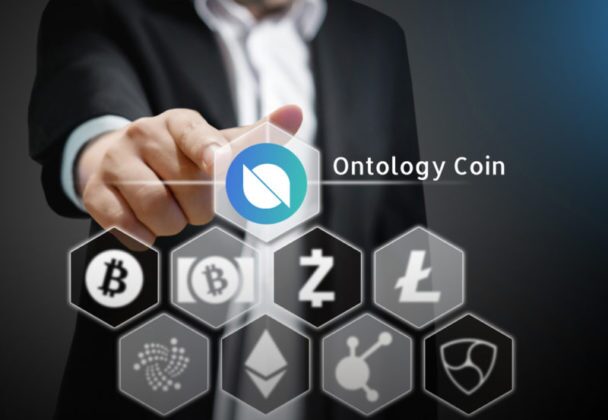 suited man pointing at ontology symbol