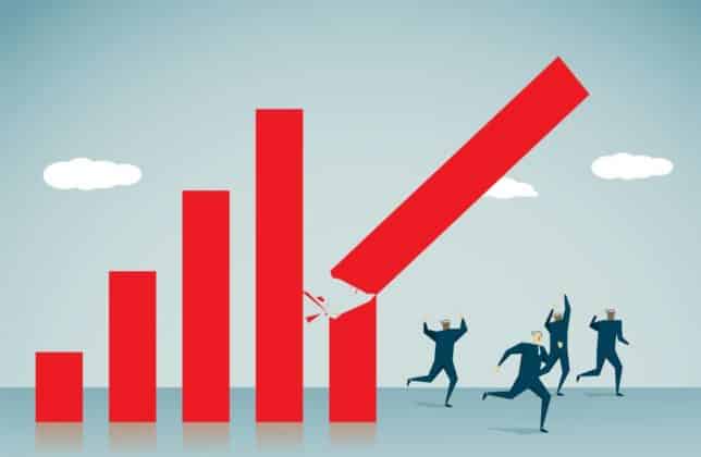 BTC Cryptocurrency red candels falling on to man representing economic recession depression 2020