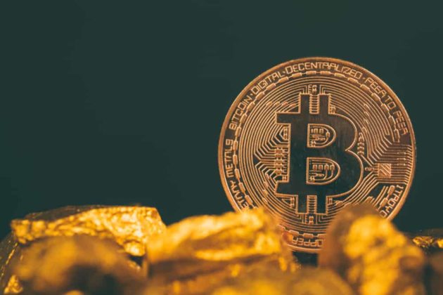 Buy-BTC-image-with-physical-Bitcoin-gold-nuggets-and-black-background Physical gold Bitcoin with dark-black background