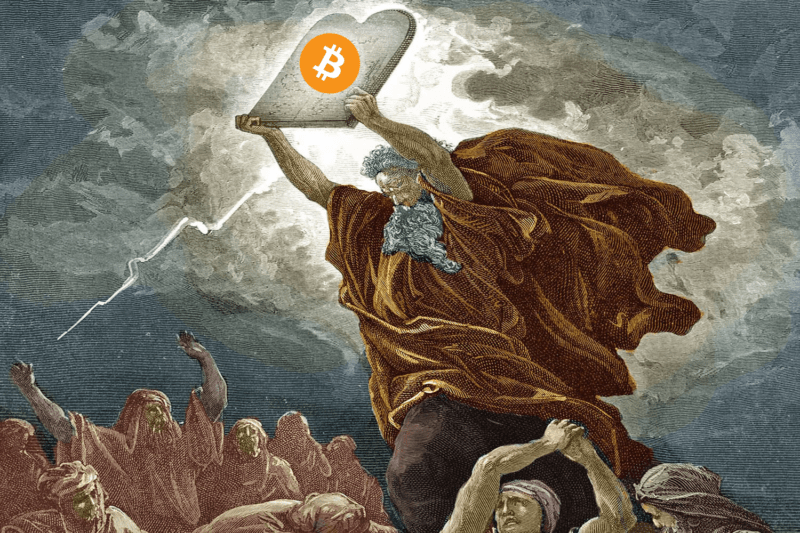 Bitcoin slate being help up by man with white beard