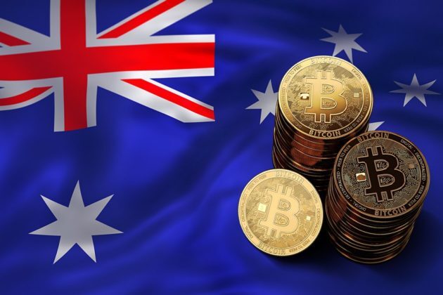 stack-of-bitcoin-btc-physical-coins-on-national-flag-of-Australia Bitcoin (BTC) is illustrated as stack of physical gold coins placed on the national flag of Australia
