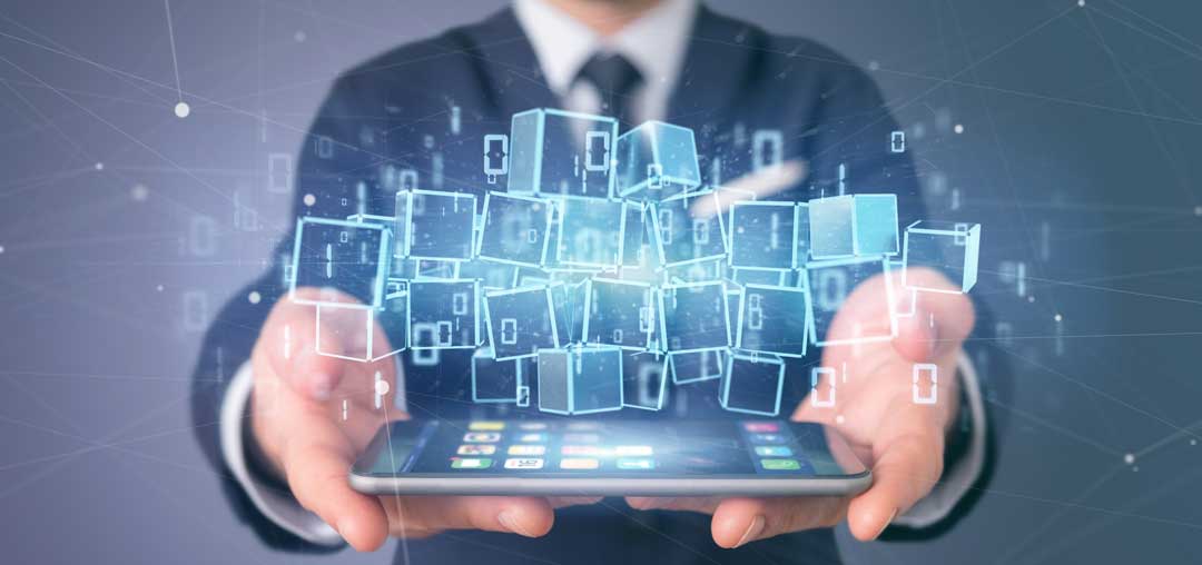 A businessman holding a smartphone and the illustration of blockchain technology