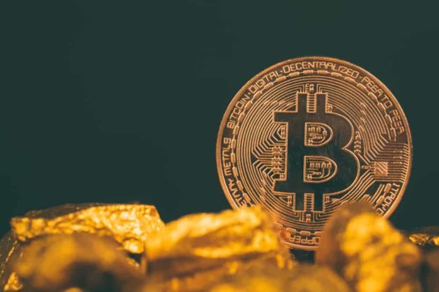 Buy-BTC-image-with-physical-Bitcoin-gold-nuggets-and-black-background Physical gold Bitcoin with dark-black background
