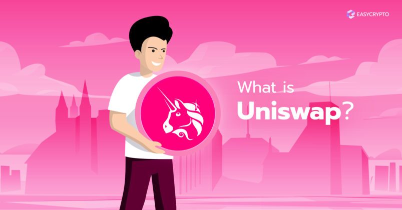 Person holding the pink Uniswap logo Person holding the pink Uniswap logo
