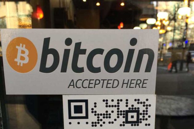 A sign that explains if businesses accept Bitcoin (BTC) in Australia as a legal payment method