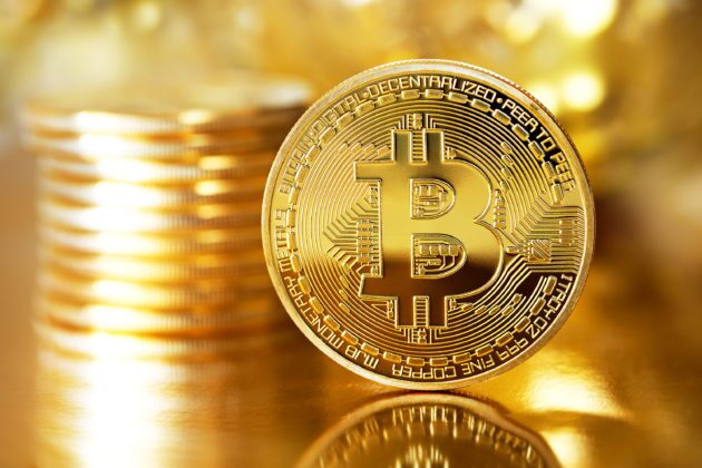 Illustration of physical Bitcoin with gold color